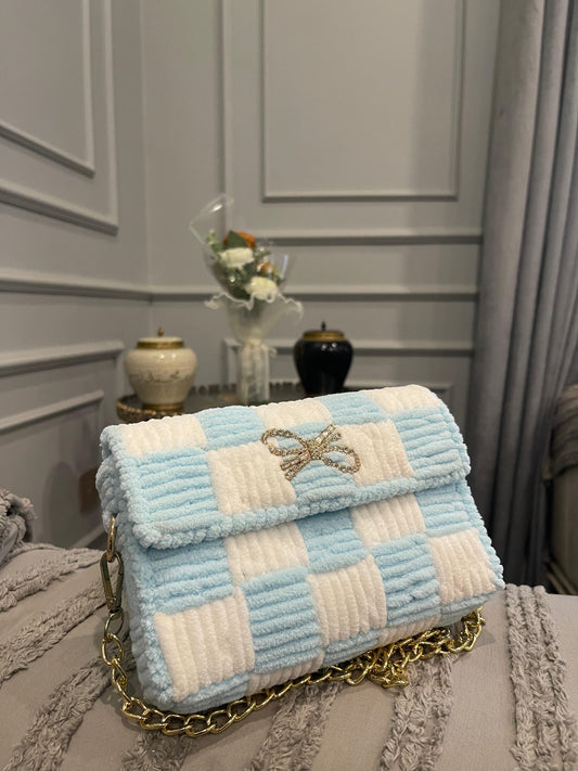 Elegant Blue & White Textured Quilted Clutch Bag with Rhinestone Bow & Gold Chain Strap